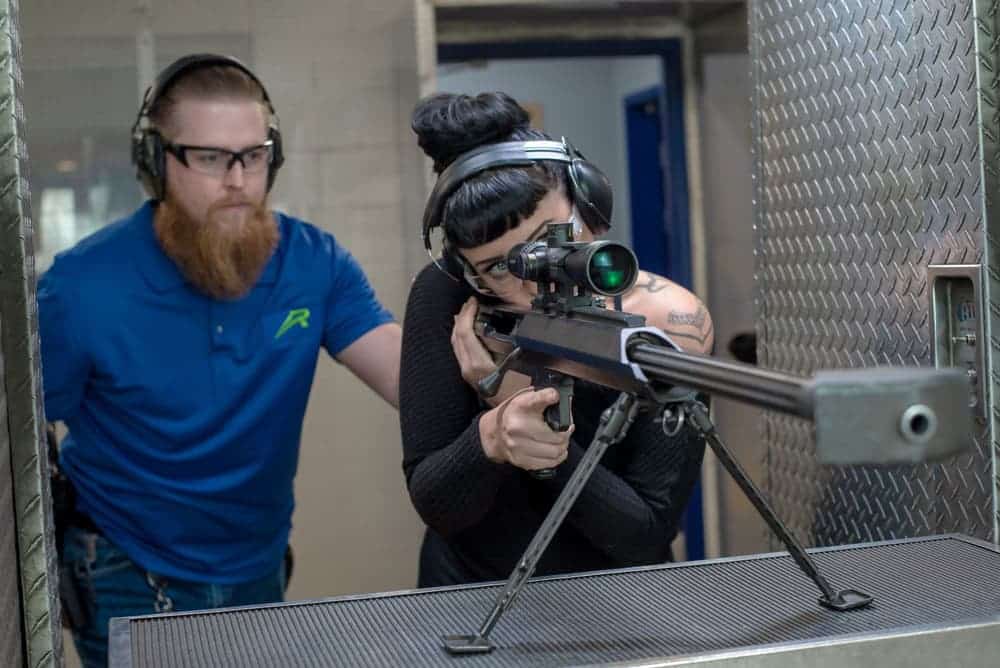 lady shooting a 50 cal sniper rifle
