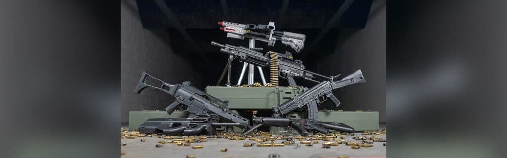an assortment of guns at the range 702