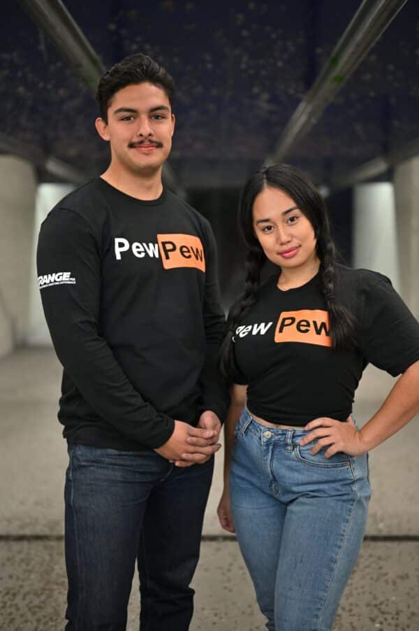 A man and woman posing at The Range 702.