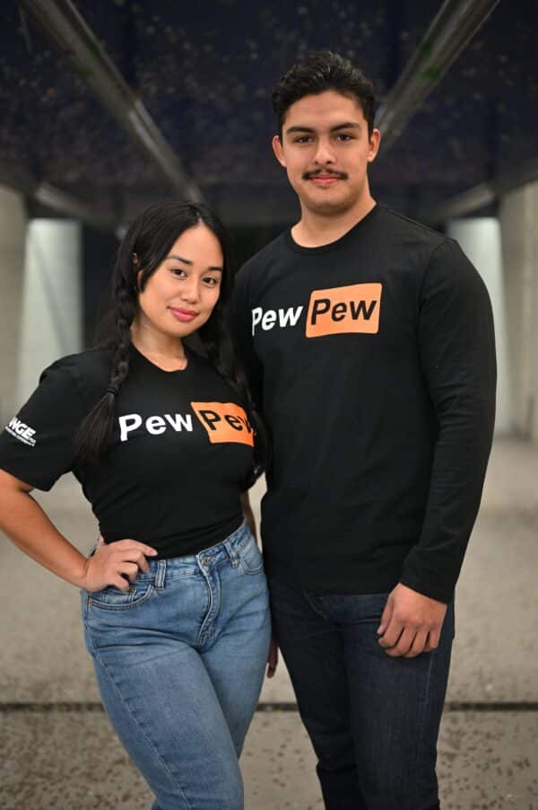 A man and woman posing at The Range 702.