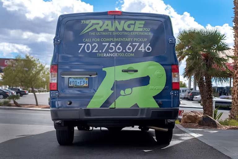 The back of The Range 702's transporation van.