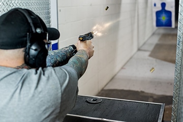 man shooting glock at the range 702 in las vegas