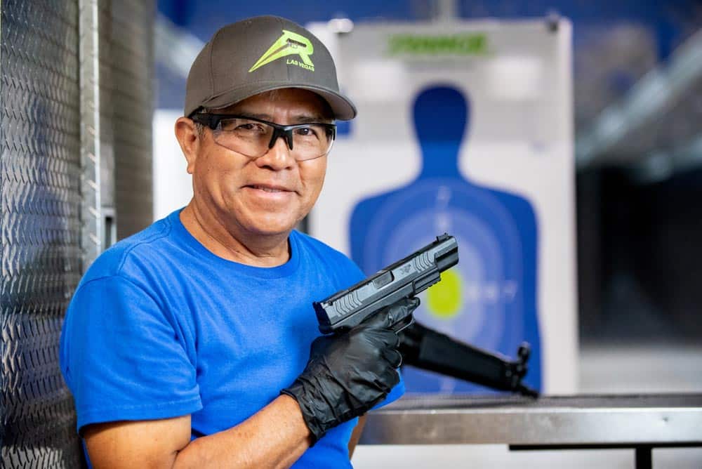 people at the range 702 in las vegas taking gun training course