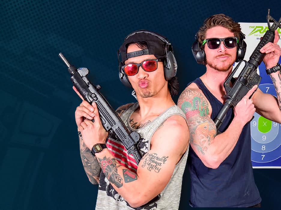 two guys holding g36 machine guns