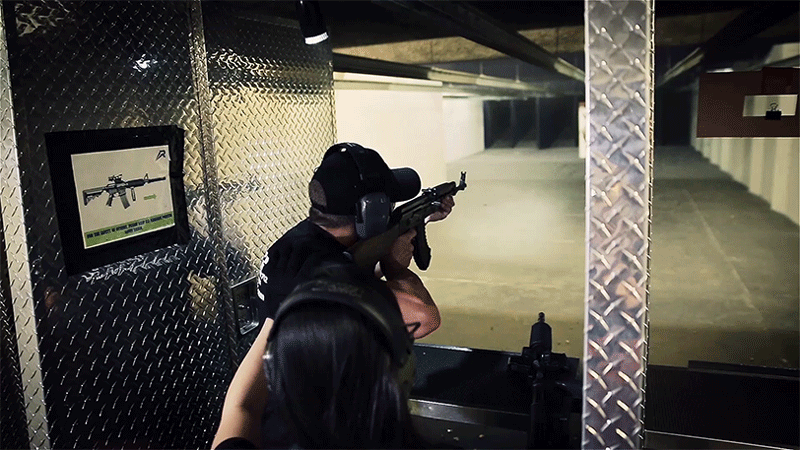 man shooting machine gun at the range 702 in las vegas