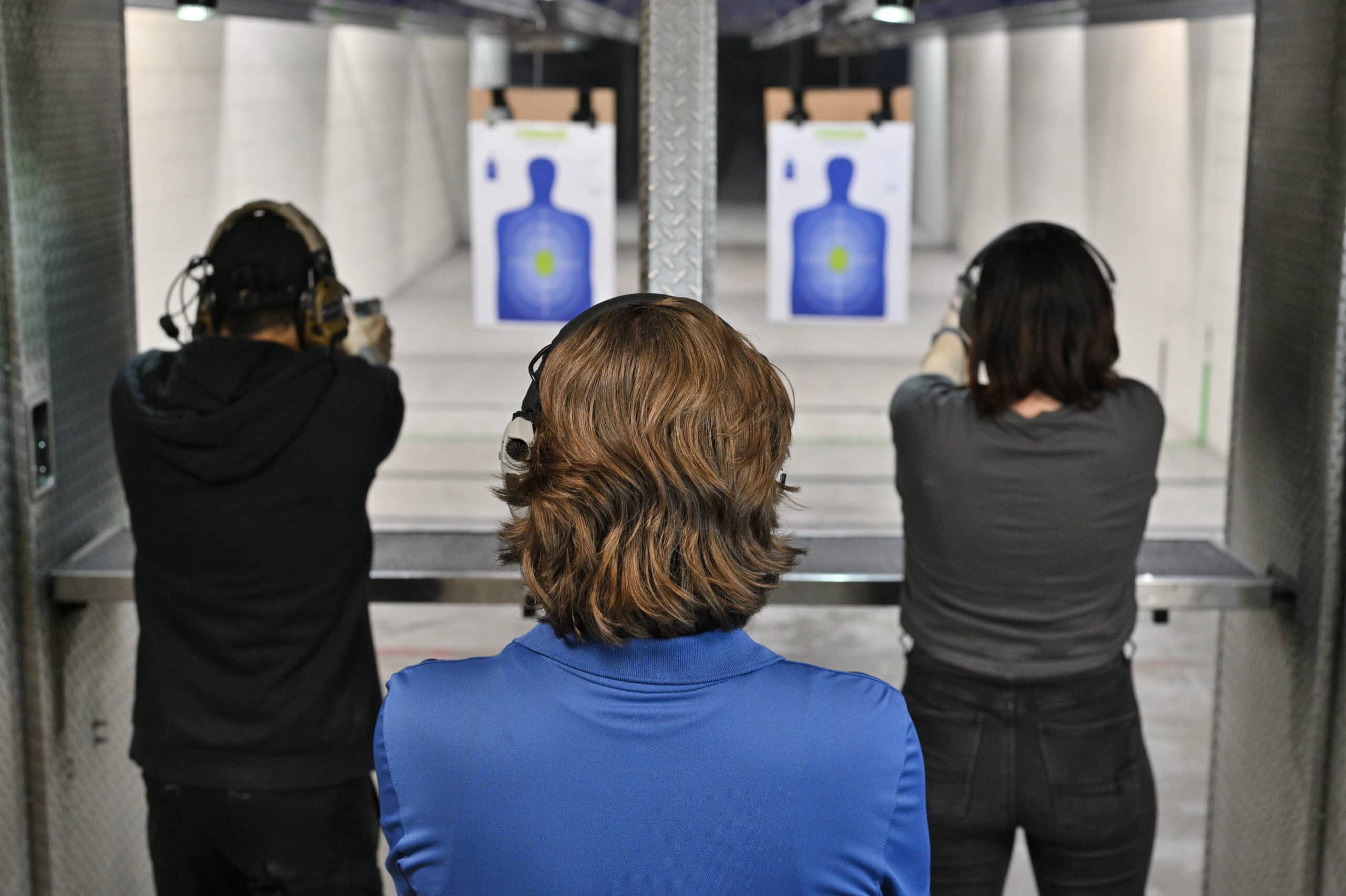 A CCW instructor at The Range 702 in Las Vegas observes students on the shooting range